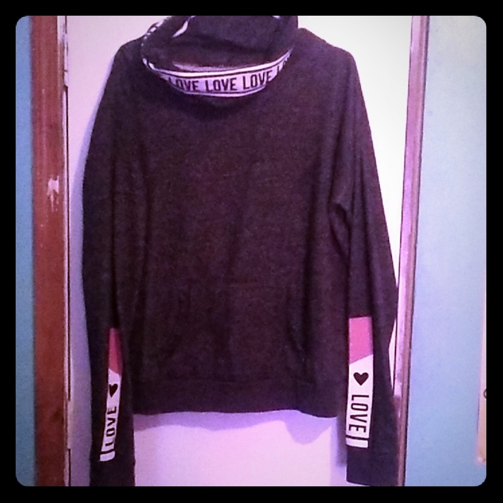 A long sleeve Love Turtle neck sweater